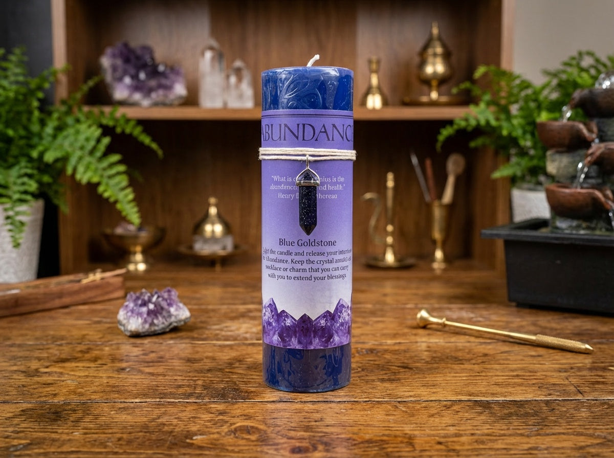 Vela de pilar con colgante de cristal energético