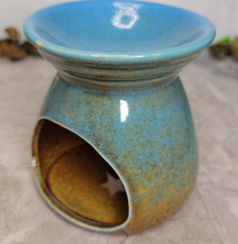 Quemador de aceite cerámico con forma de luna y estrellas